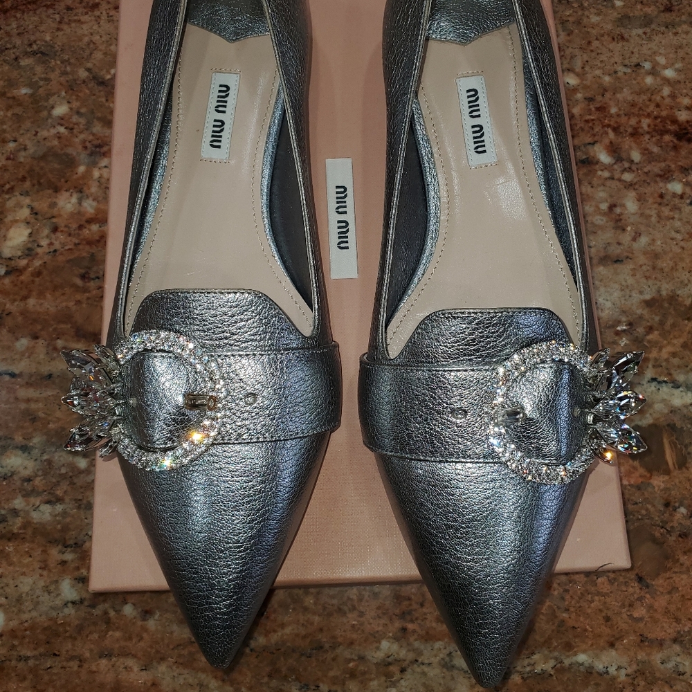 Authetic brand new Miu Miu silver flat shoes size 10 1/2.
